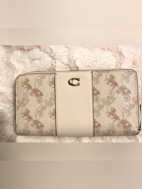 Coach beige horse and carriage Signature Convertible wallet with Gold 'C'